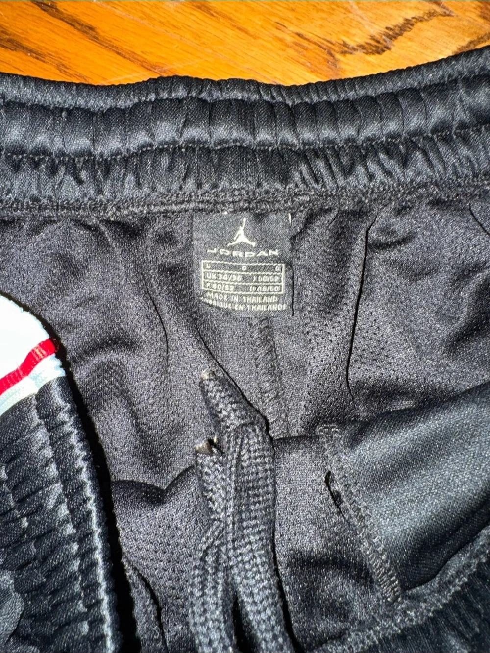 Jordan Black Athletic Shorts with White Panels and Red Trim